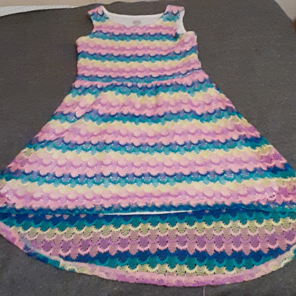 A knitted rainbow dress